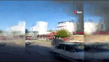 Evi yanan yaşlı çifti, komşuları kurtardı