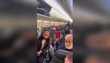 Karadağ'da bekleyiş çilesi! Saatlerce uçakta kaldılar...