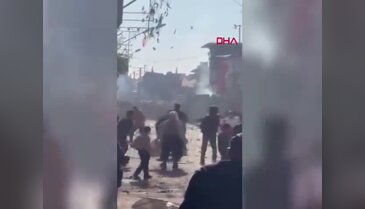 Adana'da iki grup arasındaki taşlı sopalı kavga kamerada!
