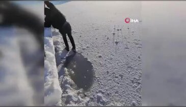 Donmuş suya düşmekten son anda kurtuldu!