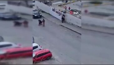 Sokak ortasında karısını dövdü, okuldaki çocuklar izledi!