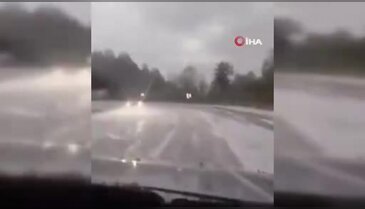 Bursa'da yaz ortasında dolu sürprizi! Yol beyaza büründü...