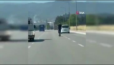 Bursa'da tehlikeli scooter sürüşü kamerada: Trafikte 90 km hızla ilerledi...