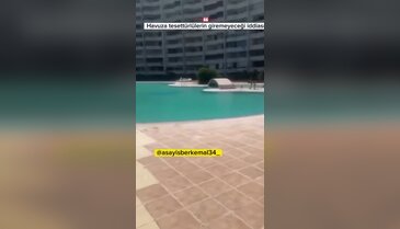 Site havuzunda tesettür krizi! Görüntüler gündem oldu