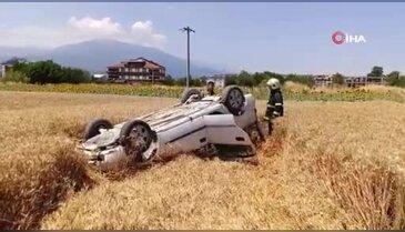 Bursa'da otomobil tarlaya uçtu!