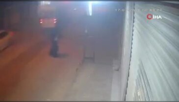 Adana'da çarşaflı saldırgan kamerada! İş yerine kurşun yağdırıp kaçtı